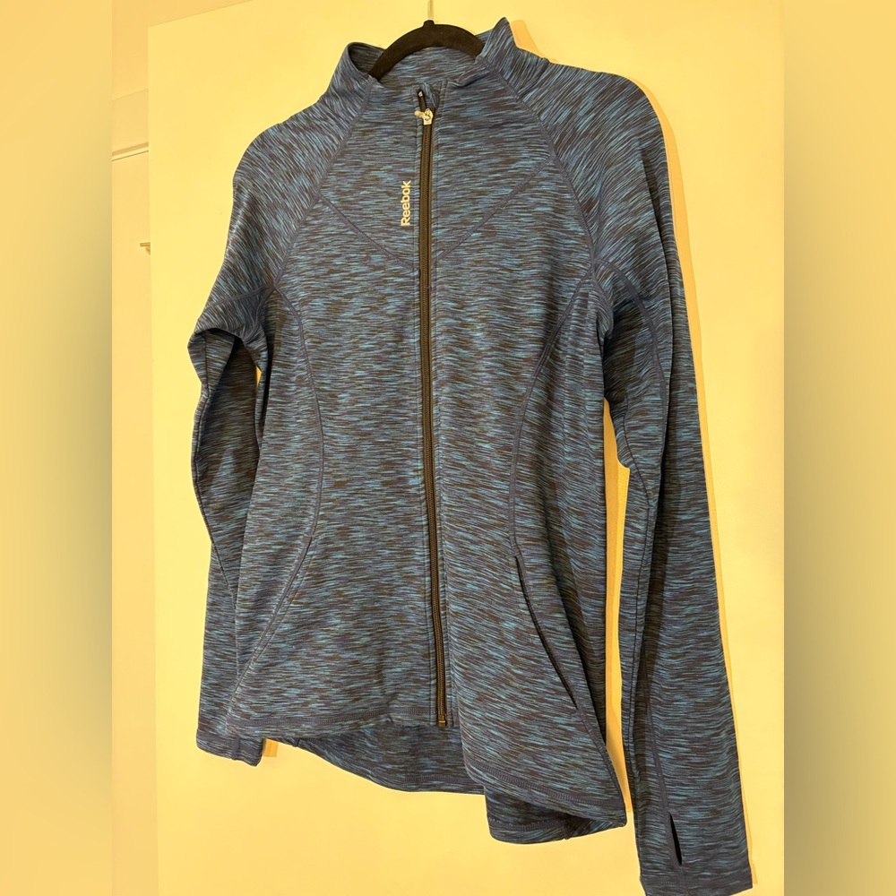 Blue athletic lightweight jacket.
